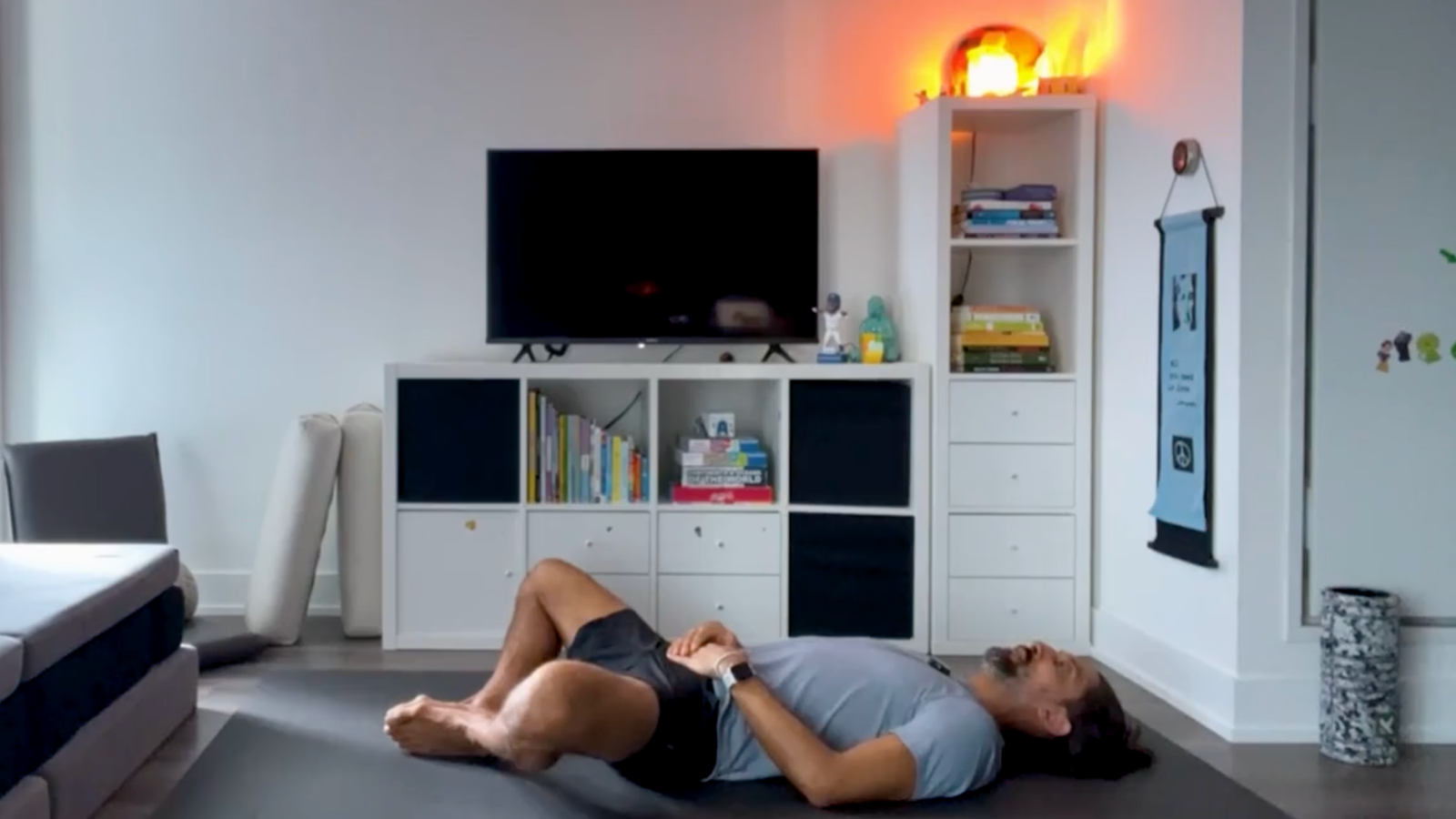 Yoga teacher Jaffer Hussain in Reclined Butterfly, part of his yoga for core strength practice